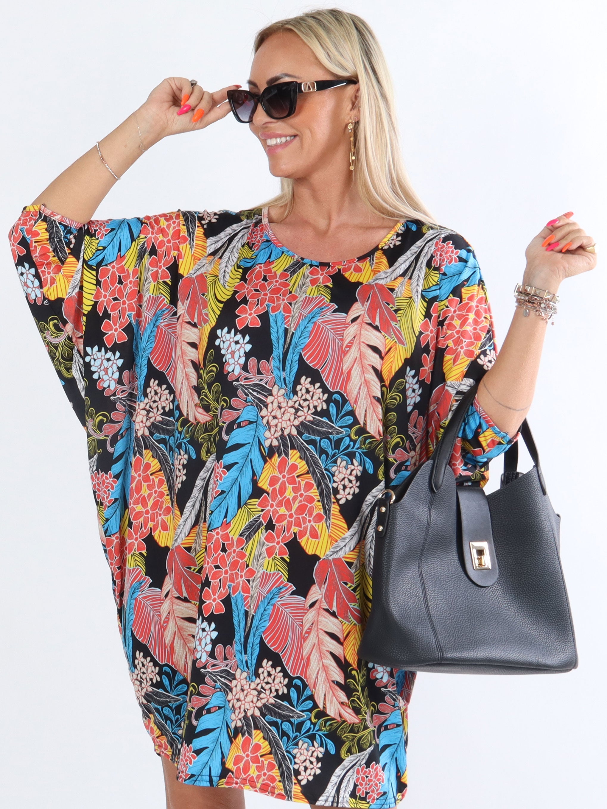 Rimini - Elastisk klänning med fladdermusärmar