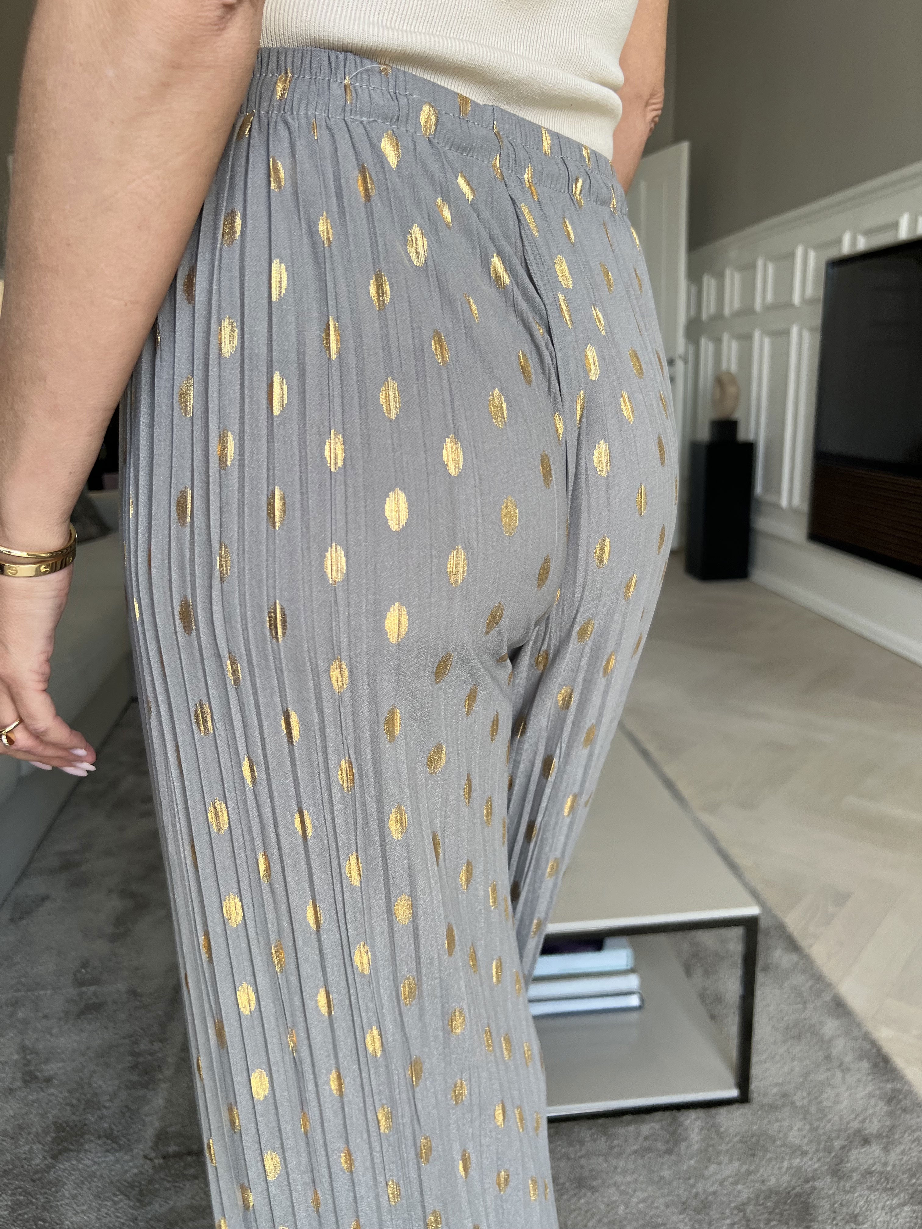 Aleta - Plisserade byxor med prickar