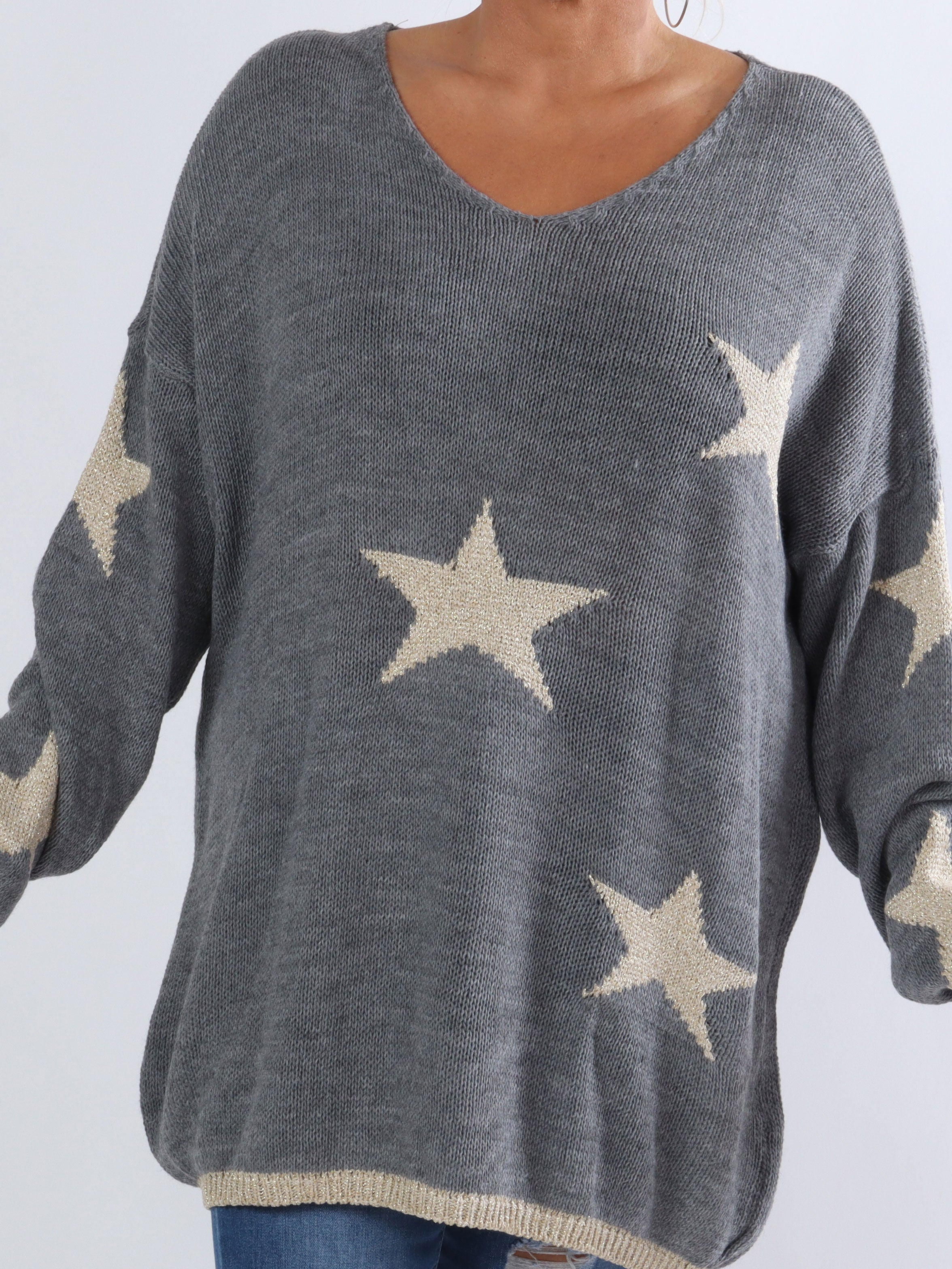 Dina - Plus size stickad med guldstjärnor