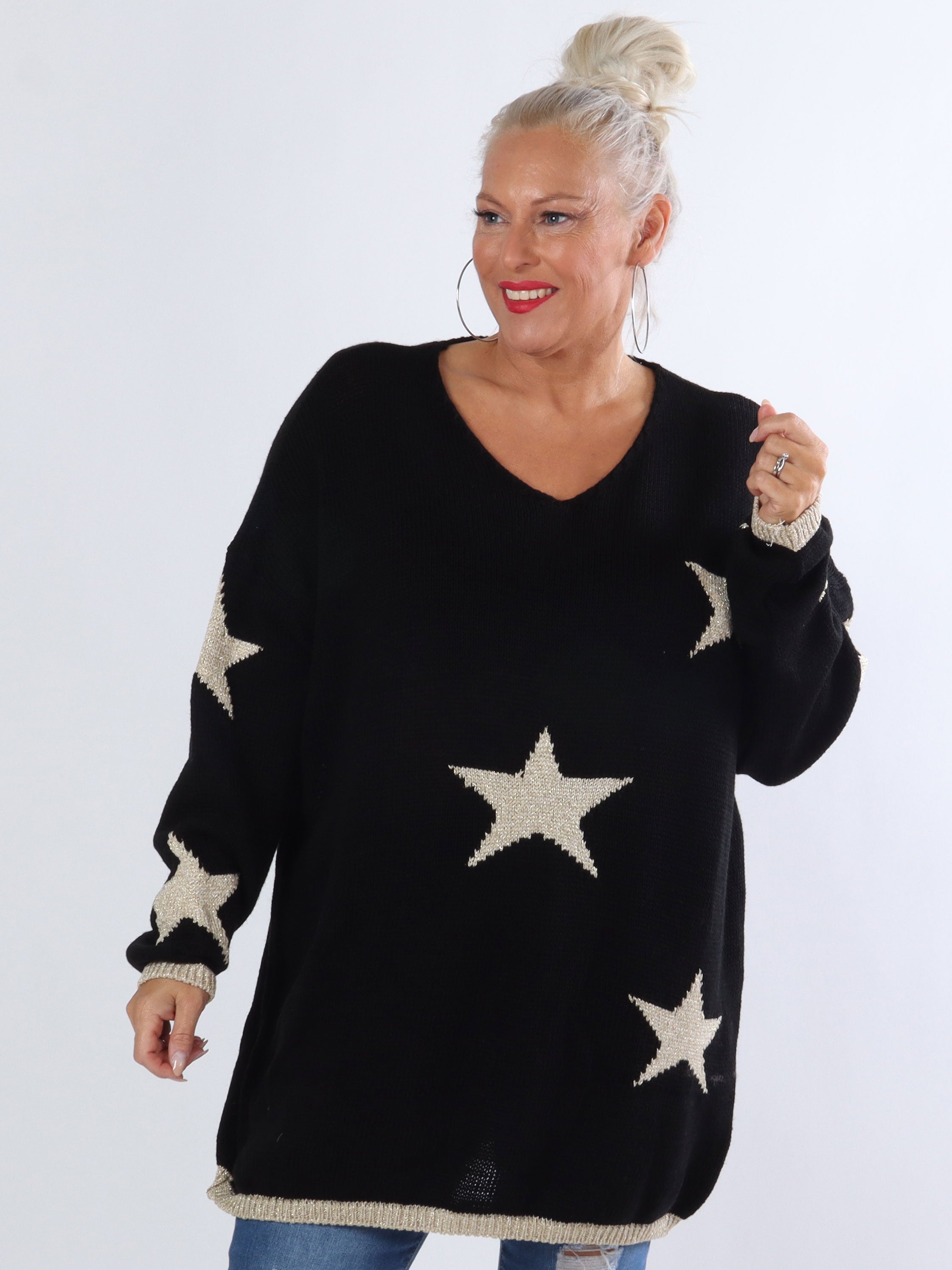 Dina - Plus size stickad med guldstjärnor