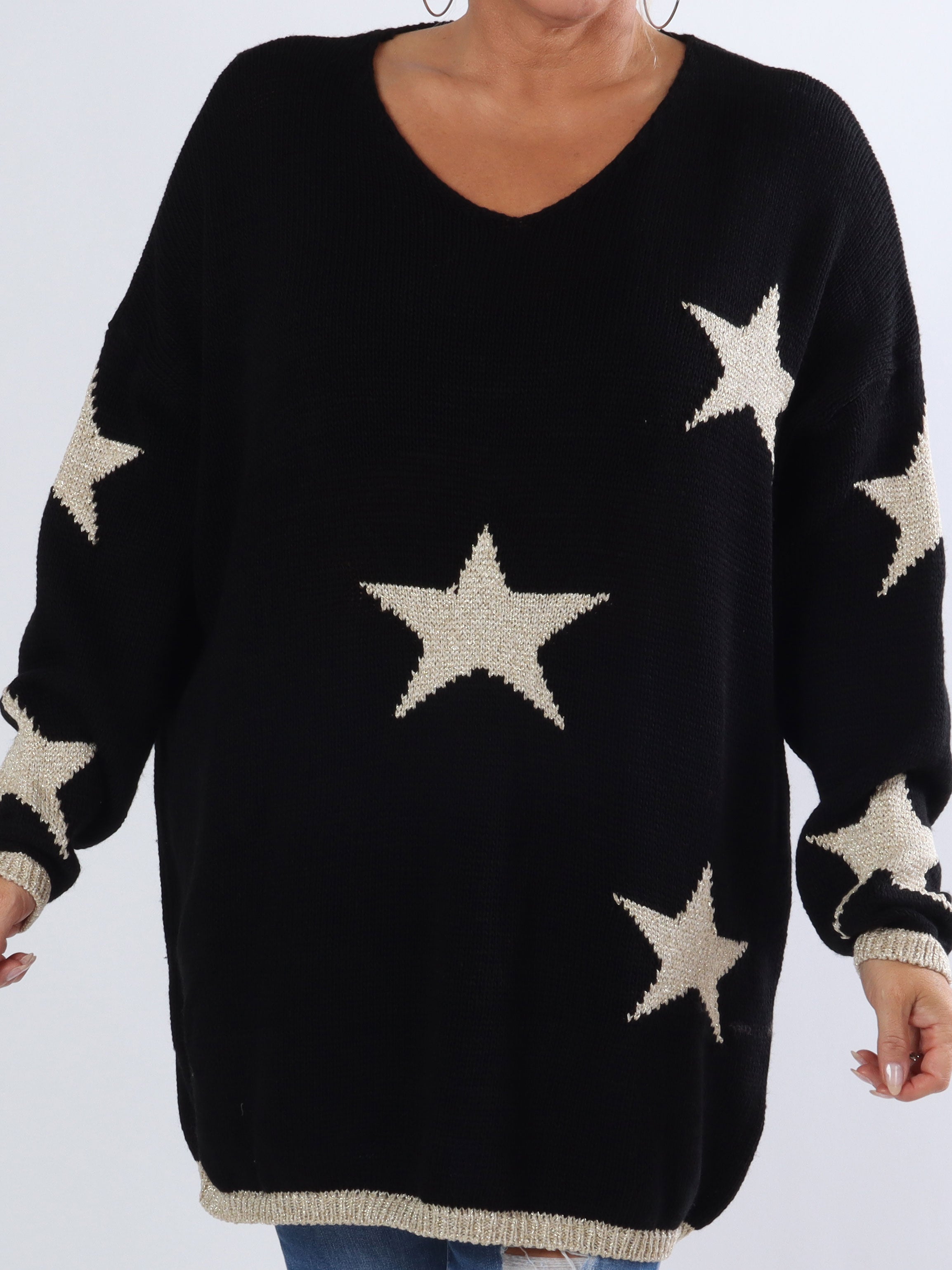 Dina - Plus size stickad med guldstjärnor