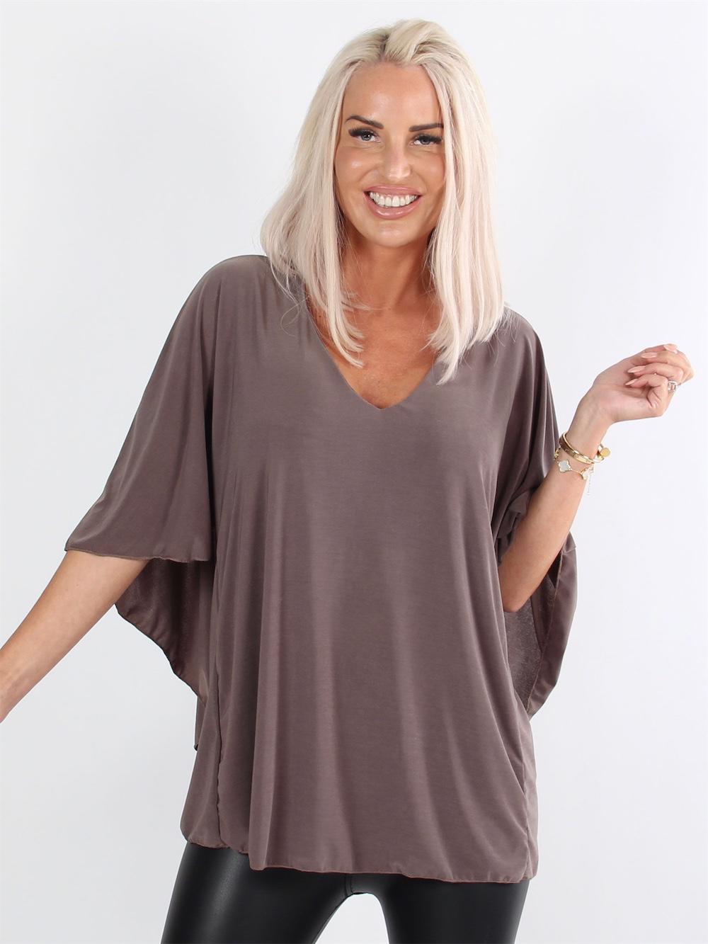 Jovana - Fin blus med fladdermusärmar och låg rygg