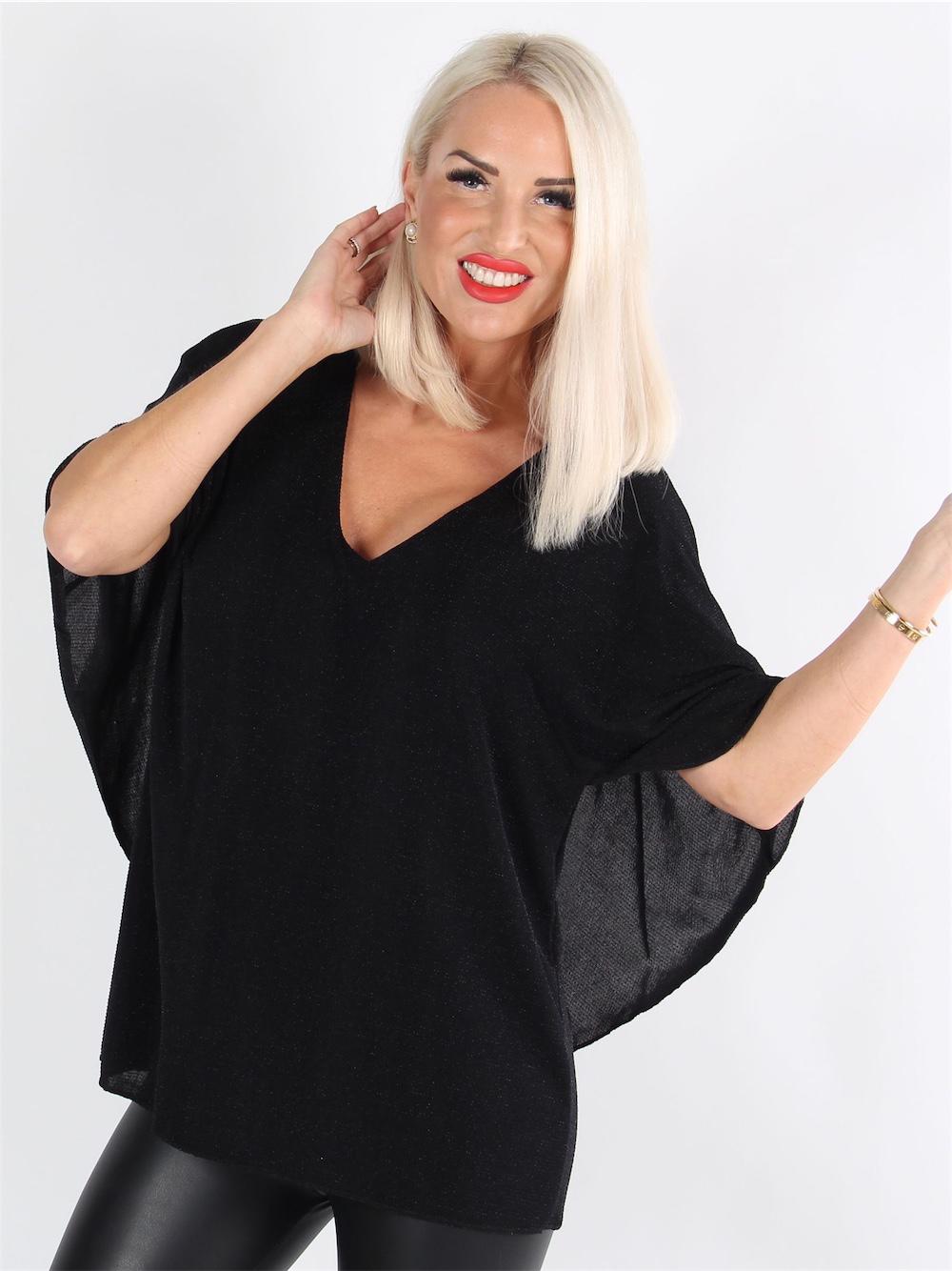 Jovana - Fin blus med fladdermusärmar och låg rygg
