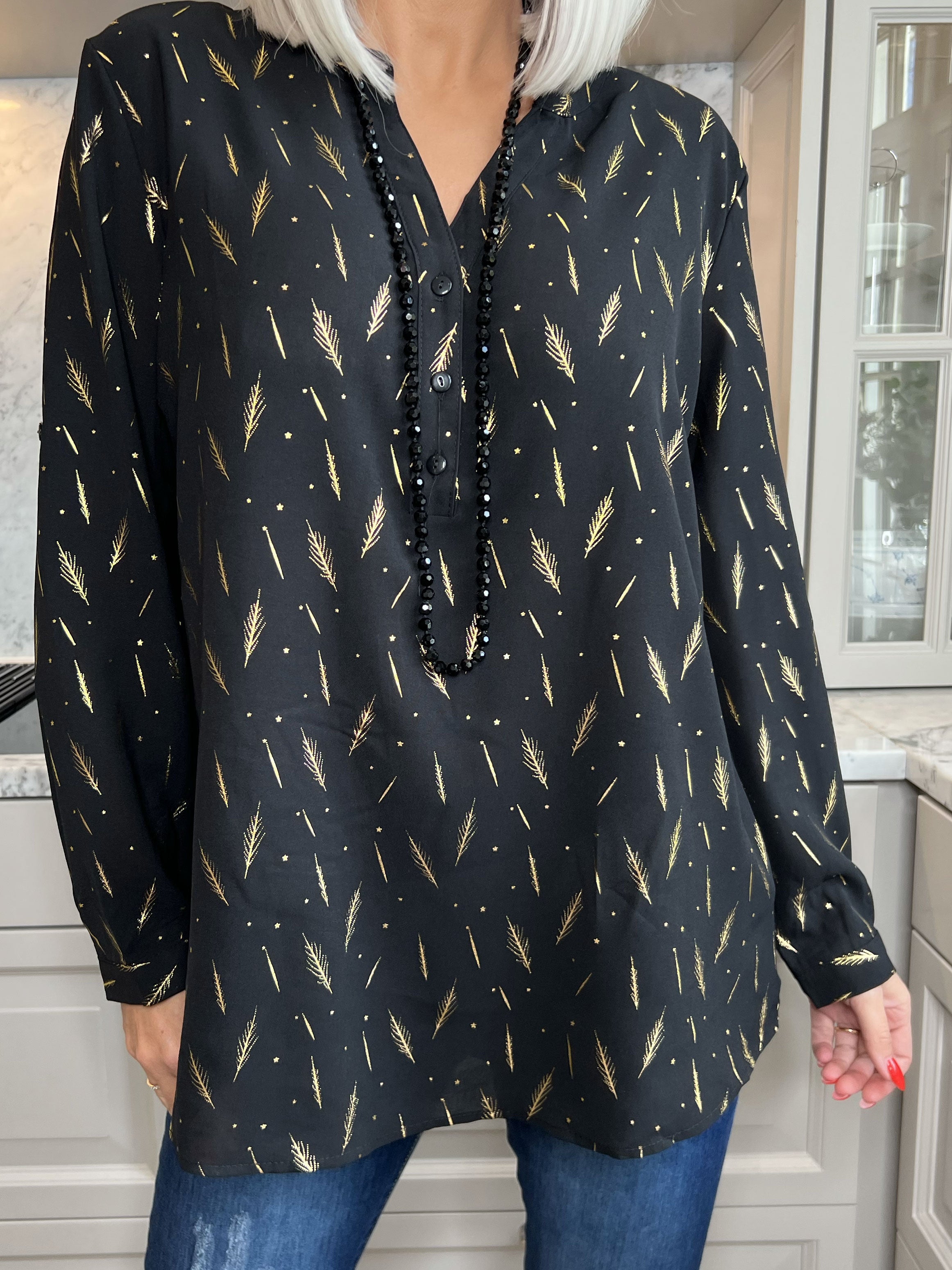 Lina - Fin skjorta med gulddetaljer