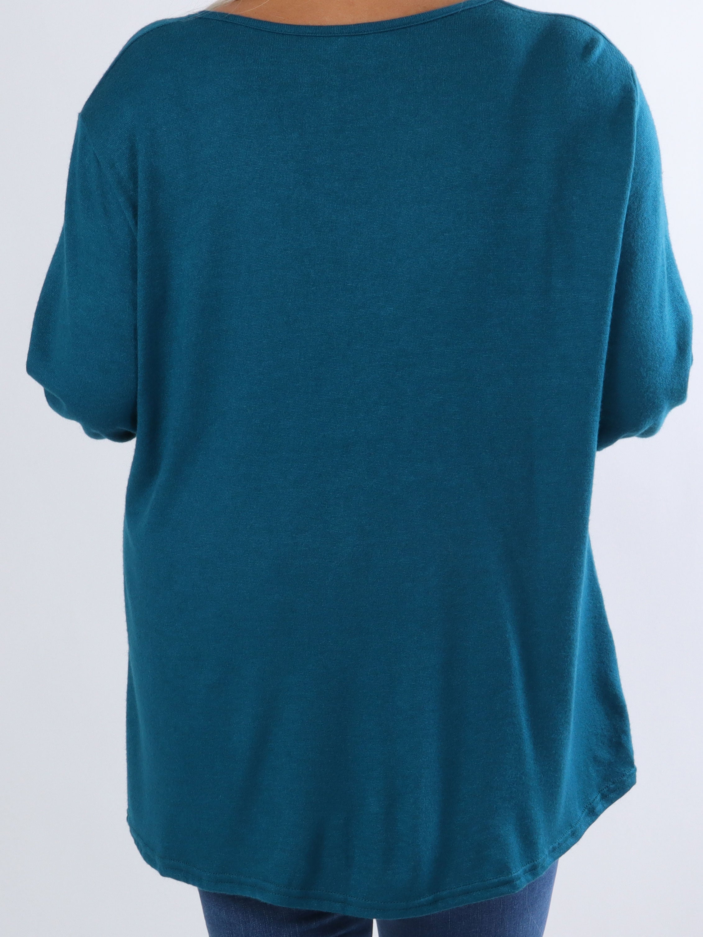 Linn - Mjuk plus size blus med knut på bröstet