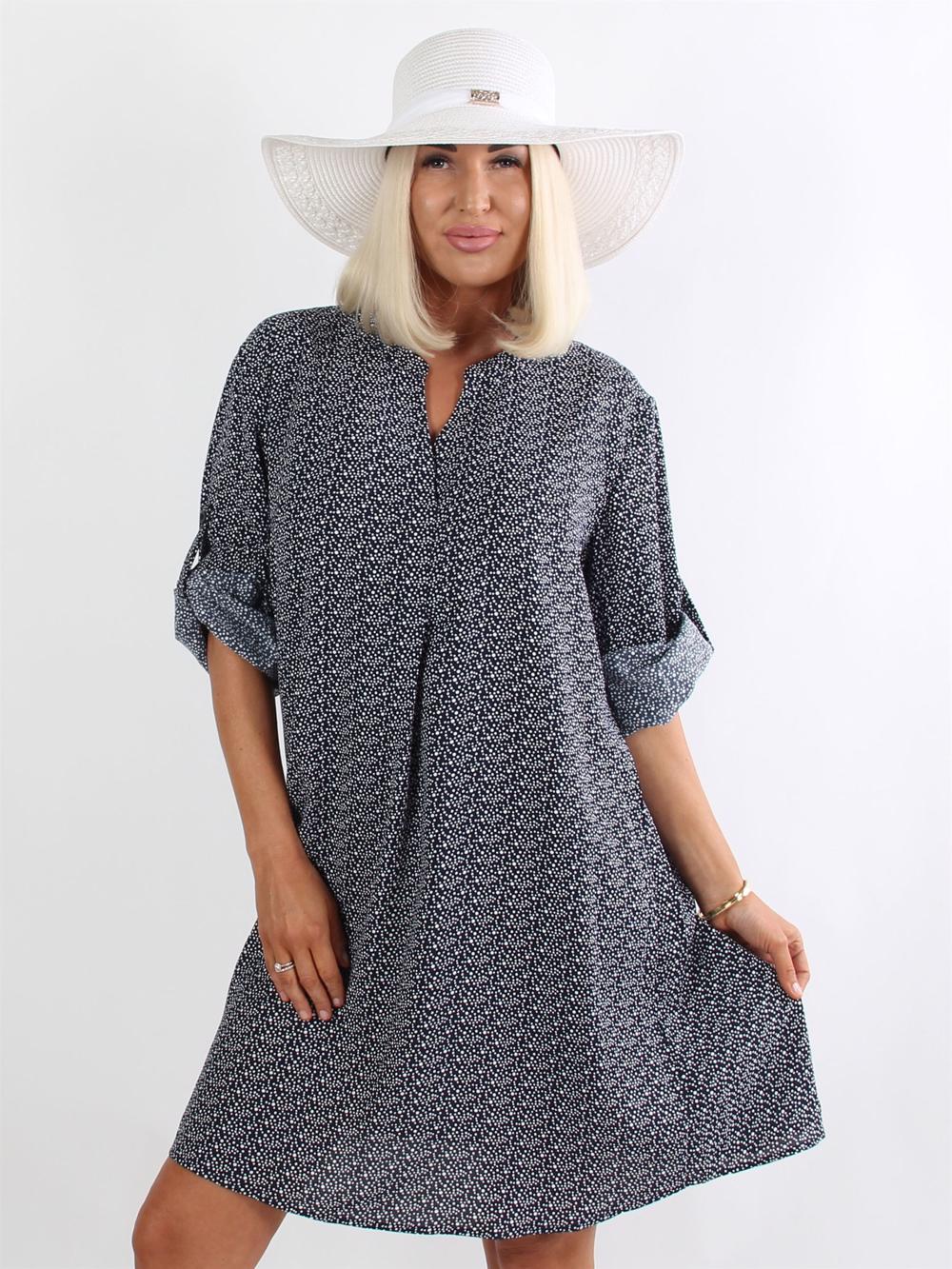 Makenna - Svart tunikaklänning med vita prickar och v-ringning