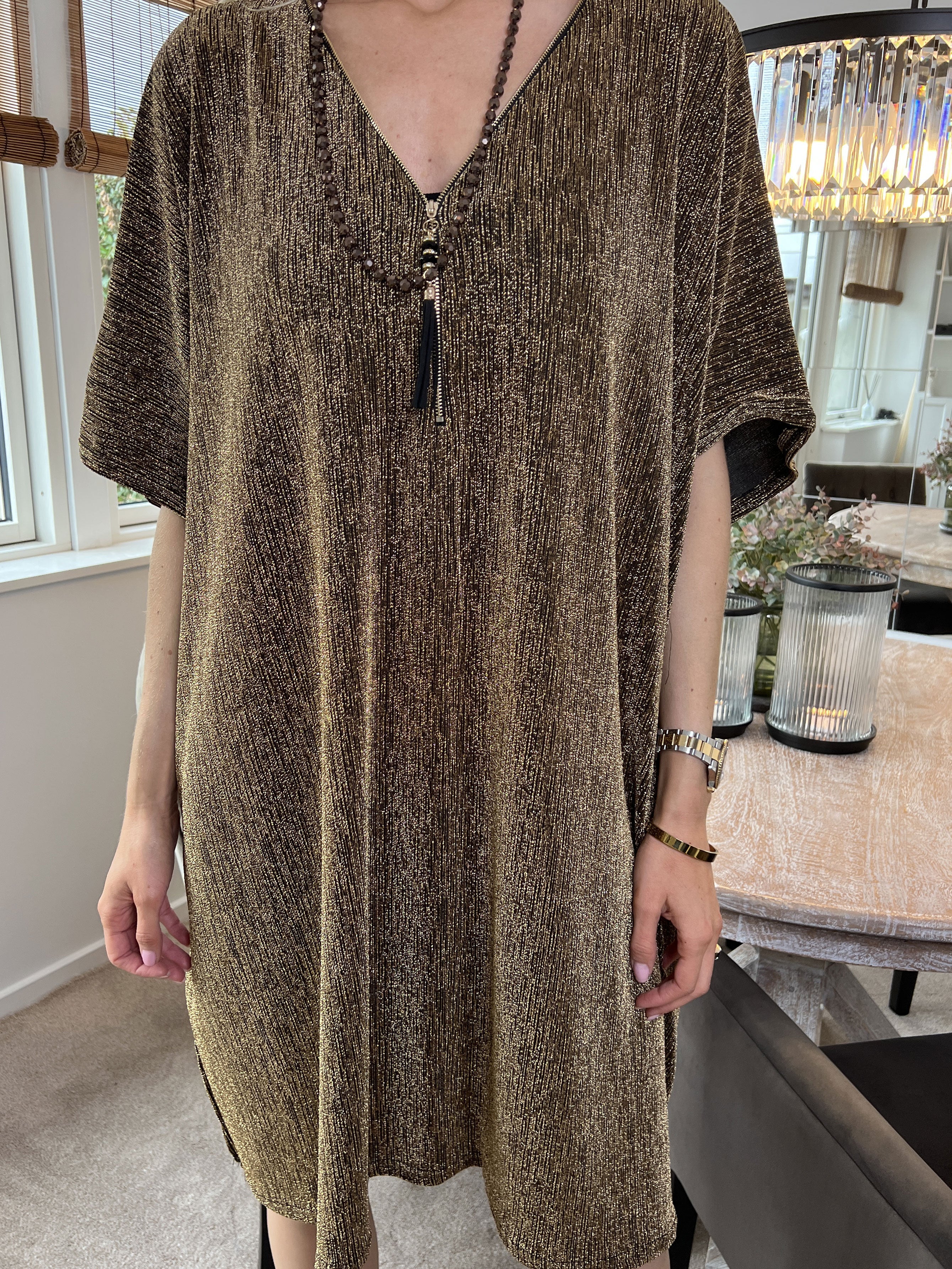 Mayte - Fin glitterklänning med blixtlås