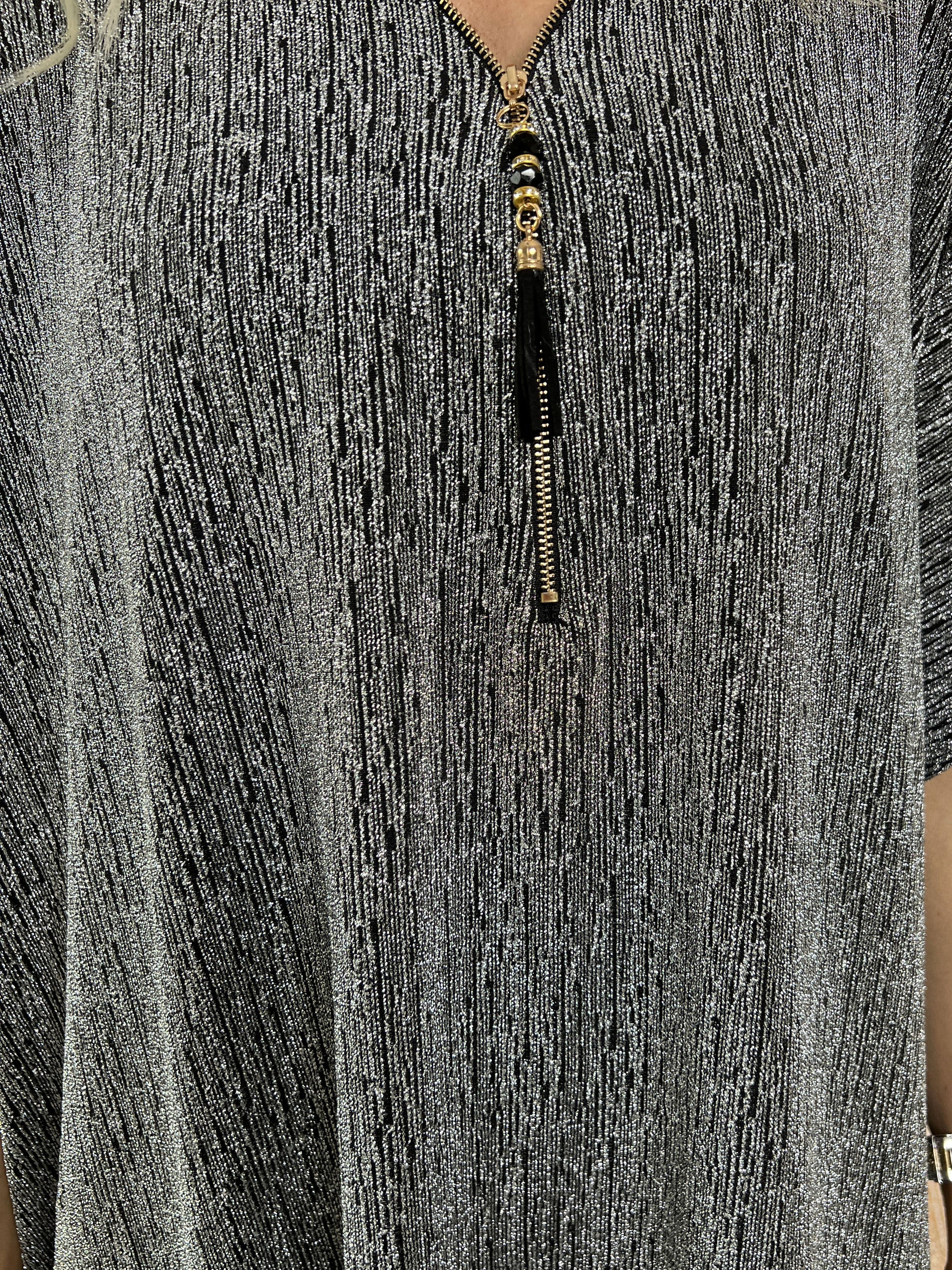 Mayte - Fin glitterklänning med blixtlås