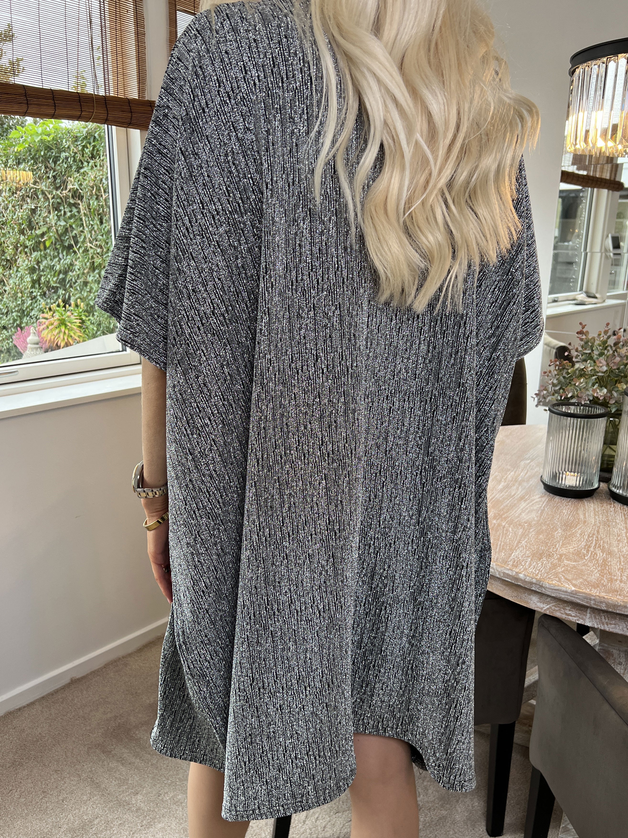 Mayte - Fin glitterklänning med blixtlås