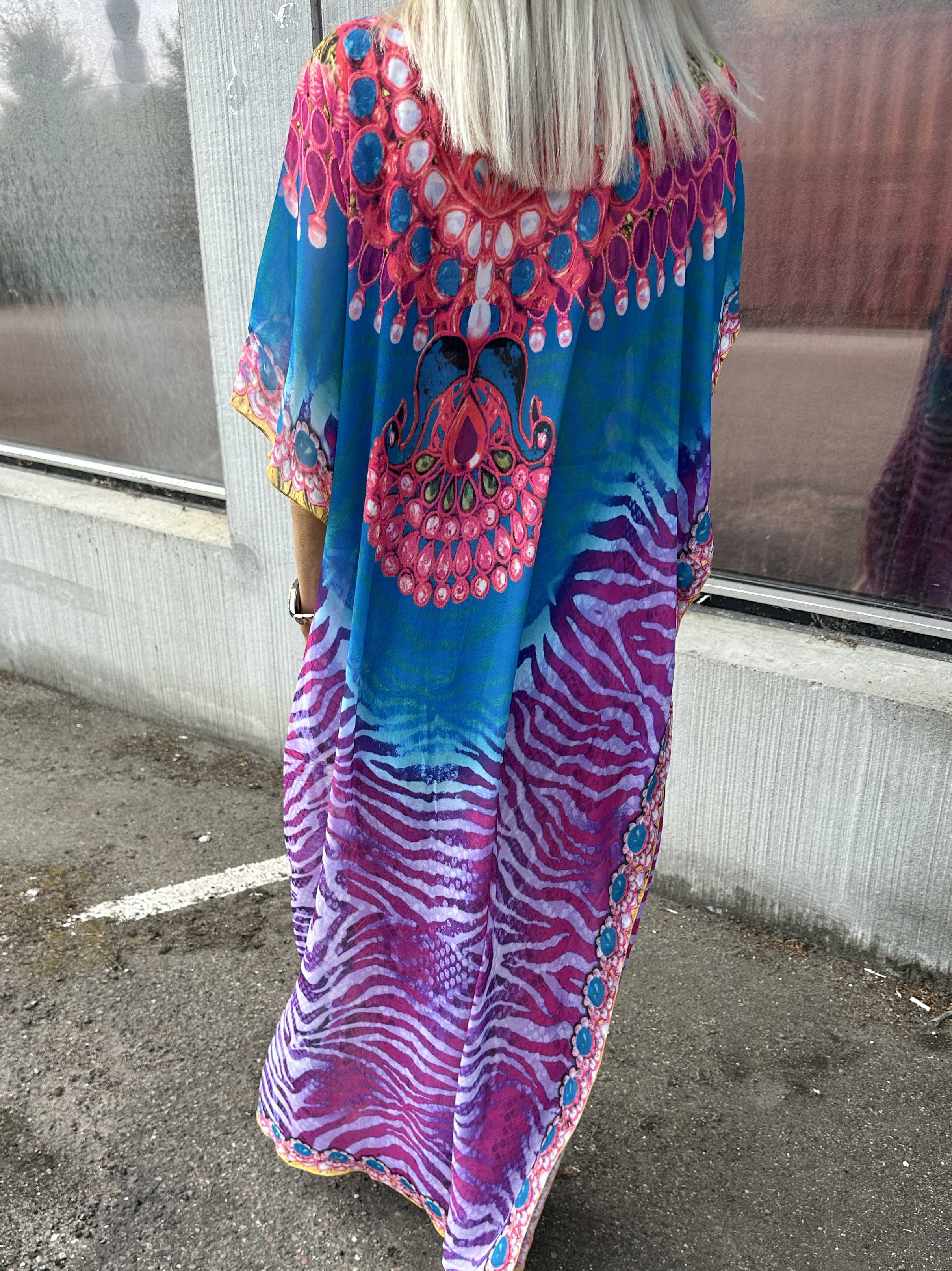 Mellie - Lång färgad halvtransparent tunika med fuskpälskant