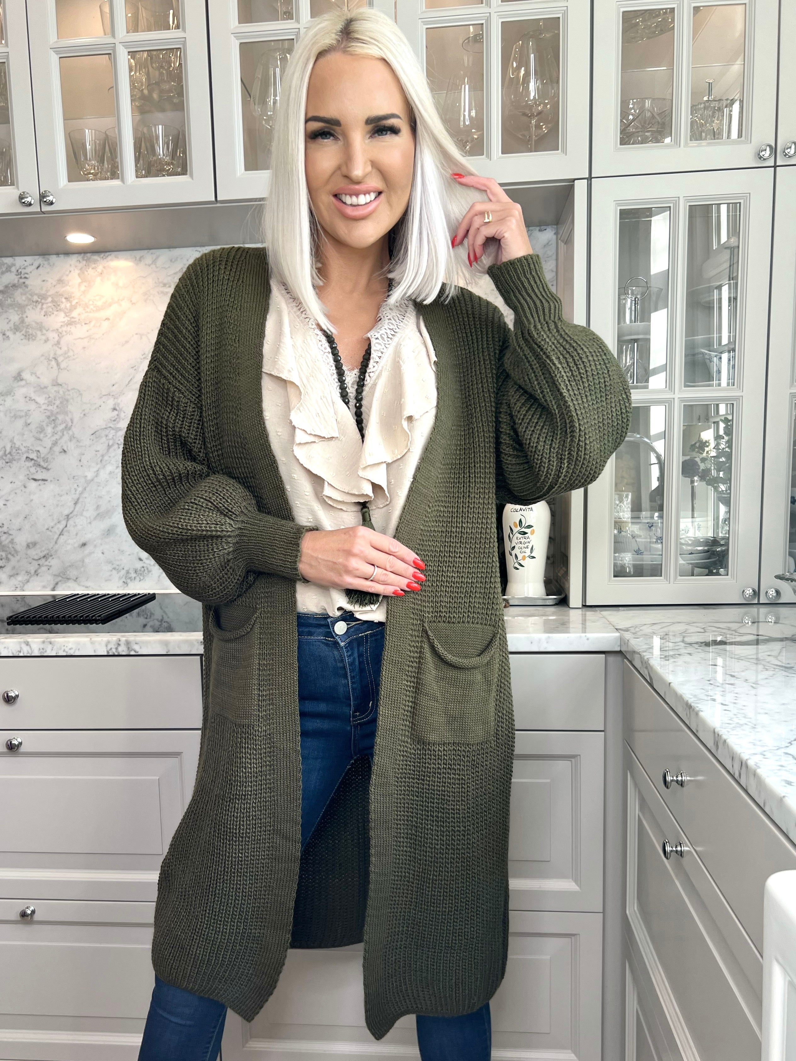 Sally - Stickad plus size kofta med ballongärmar