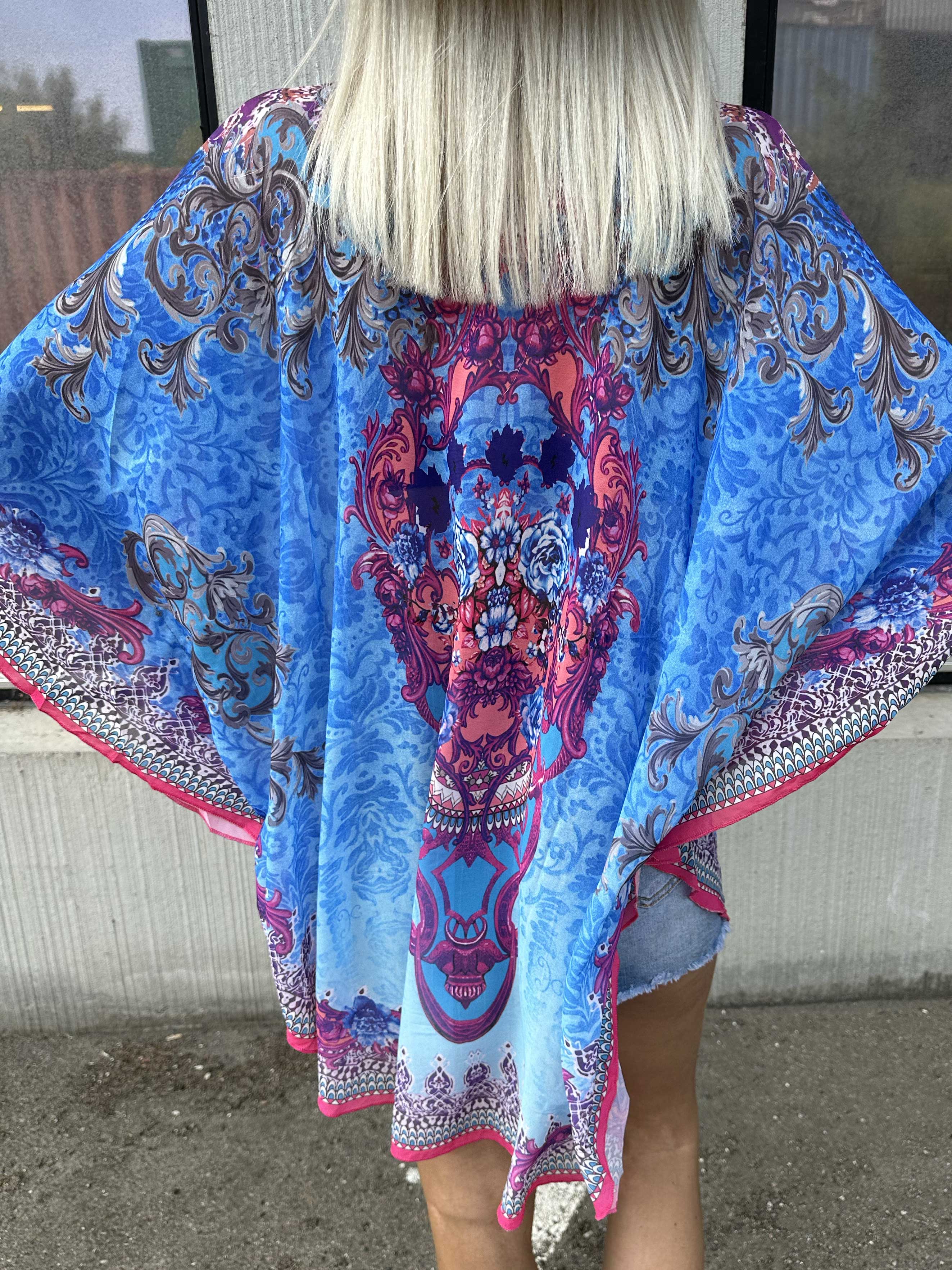 Sigga - Mönstrad halvtransparent tunika med mockabård