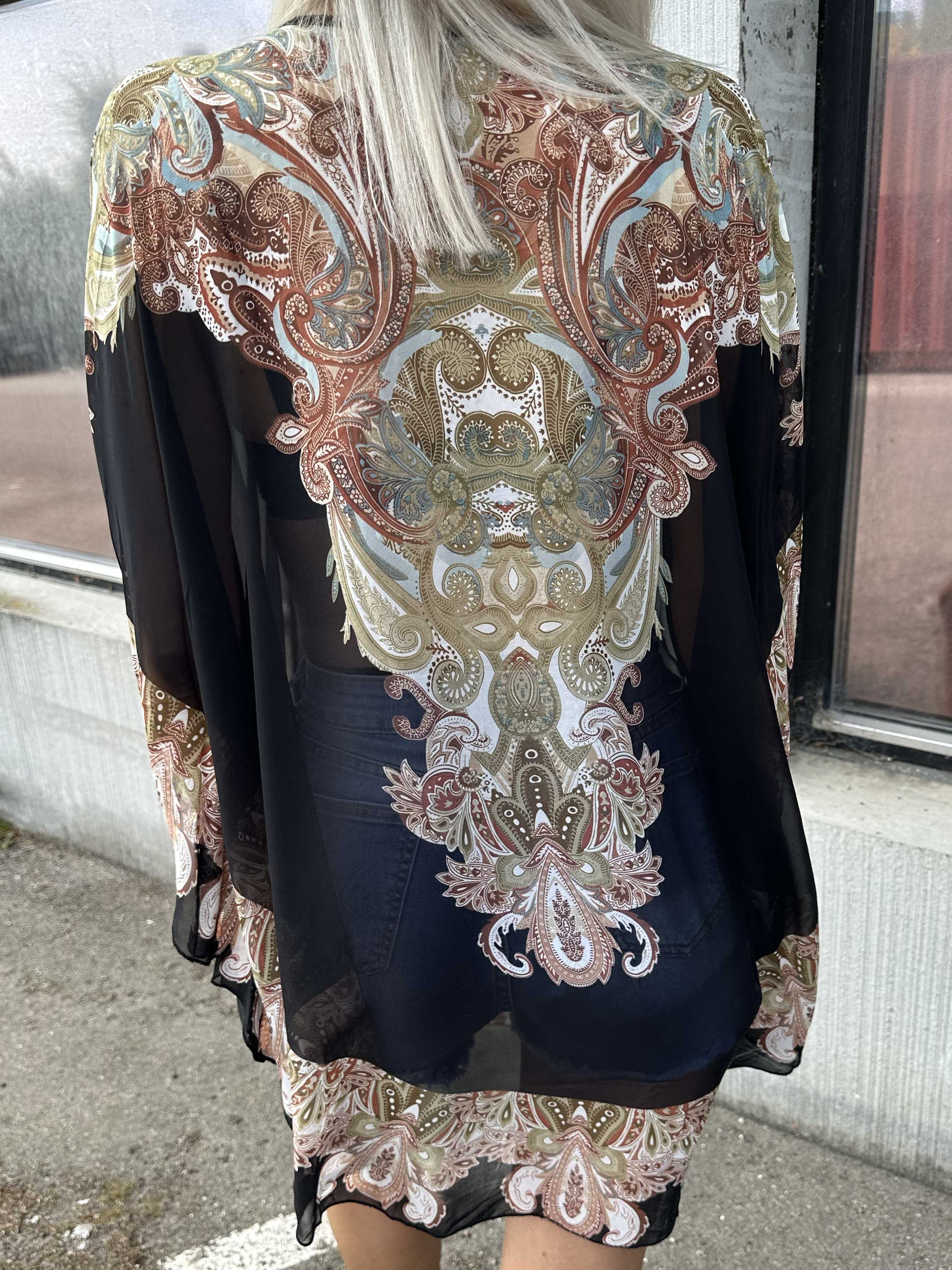 Sigga - Mönstrad halvtransparent tunika med mockabård