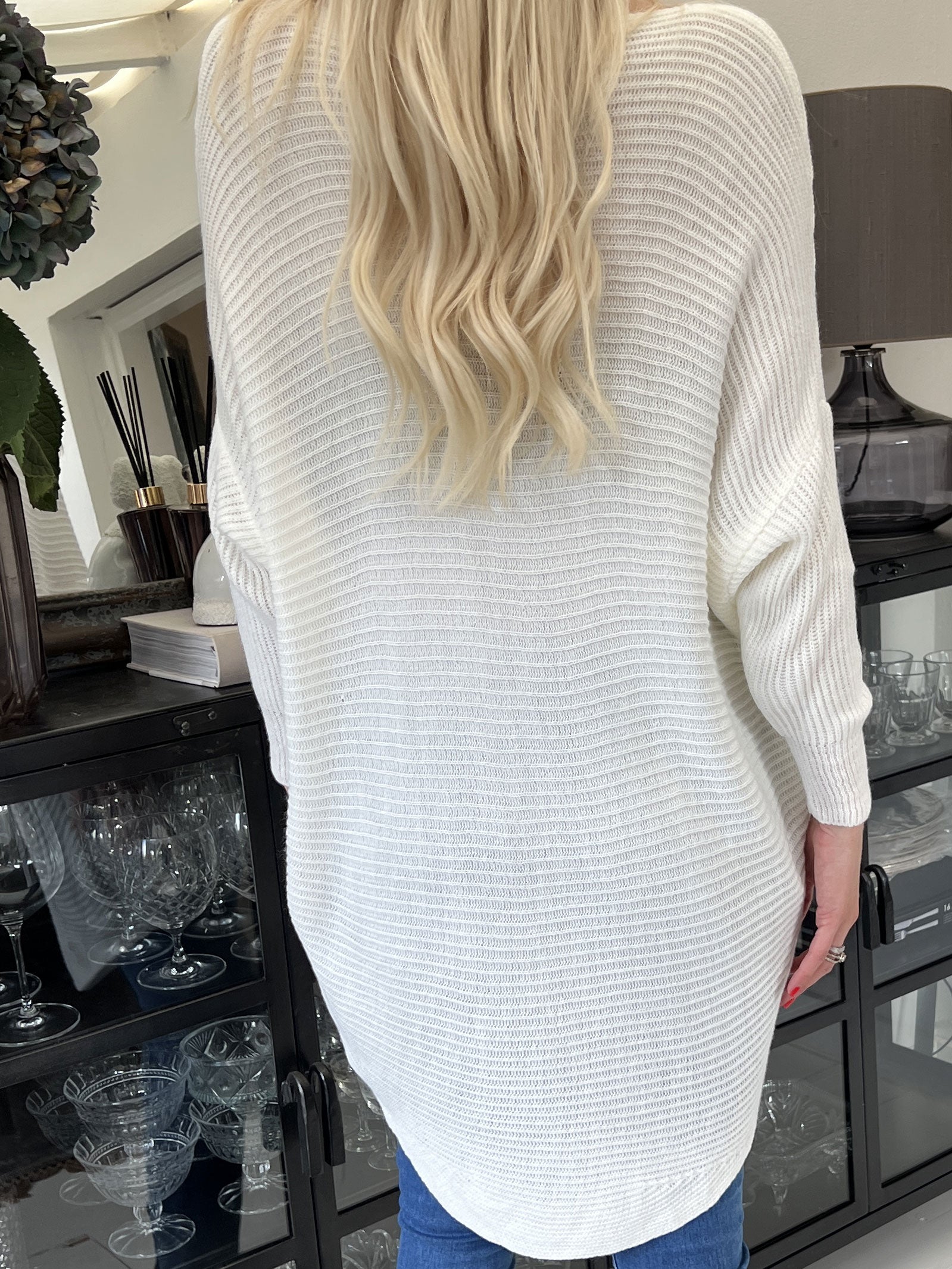 Teddy - Stickad blus med åtsittande ärmar