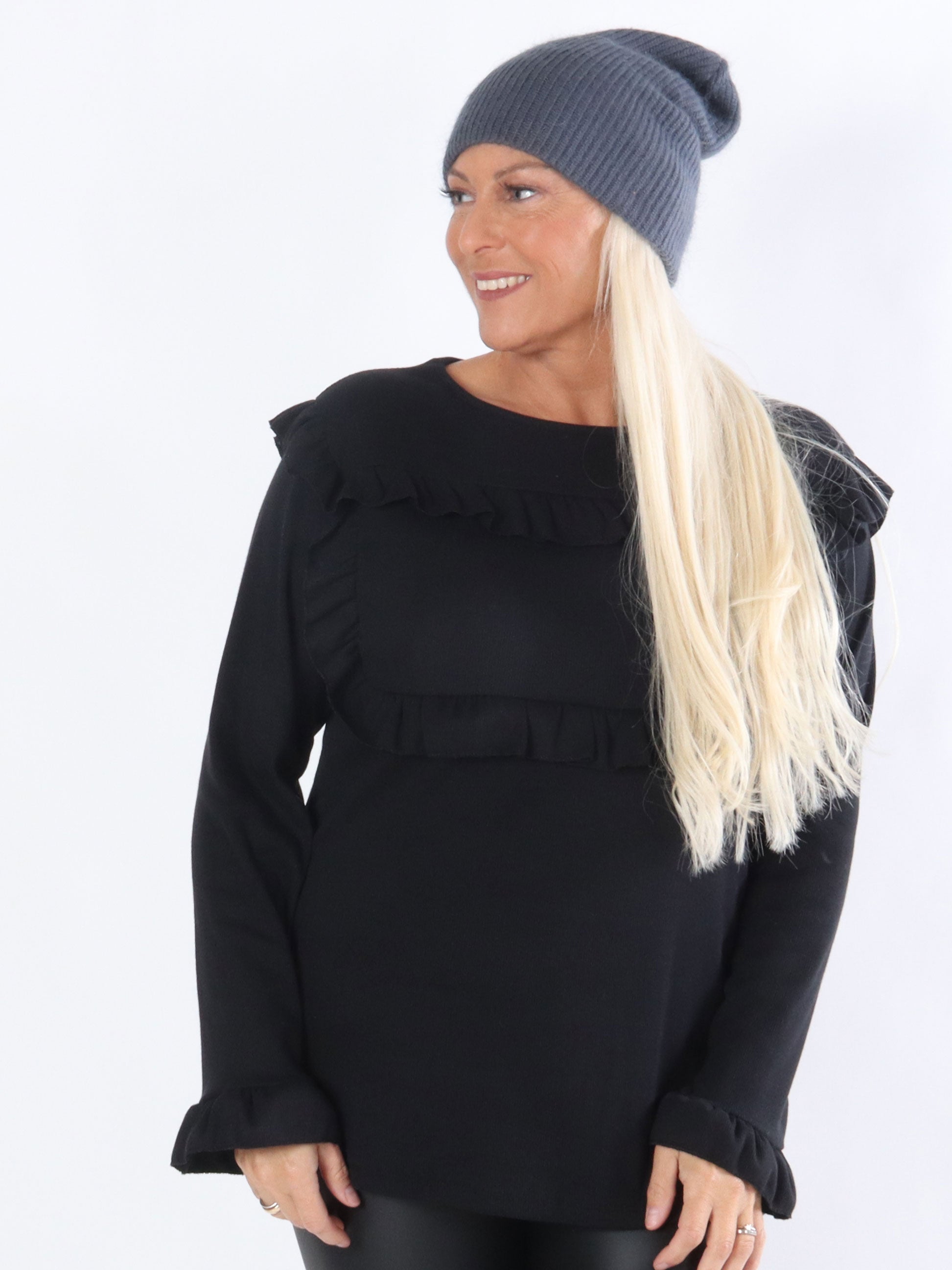 Tora - Blus med volangkanter över bröstet