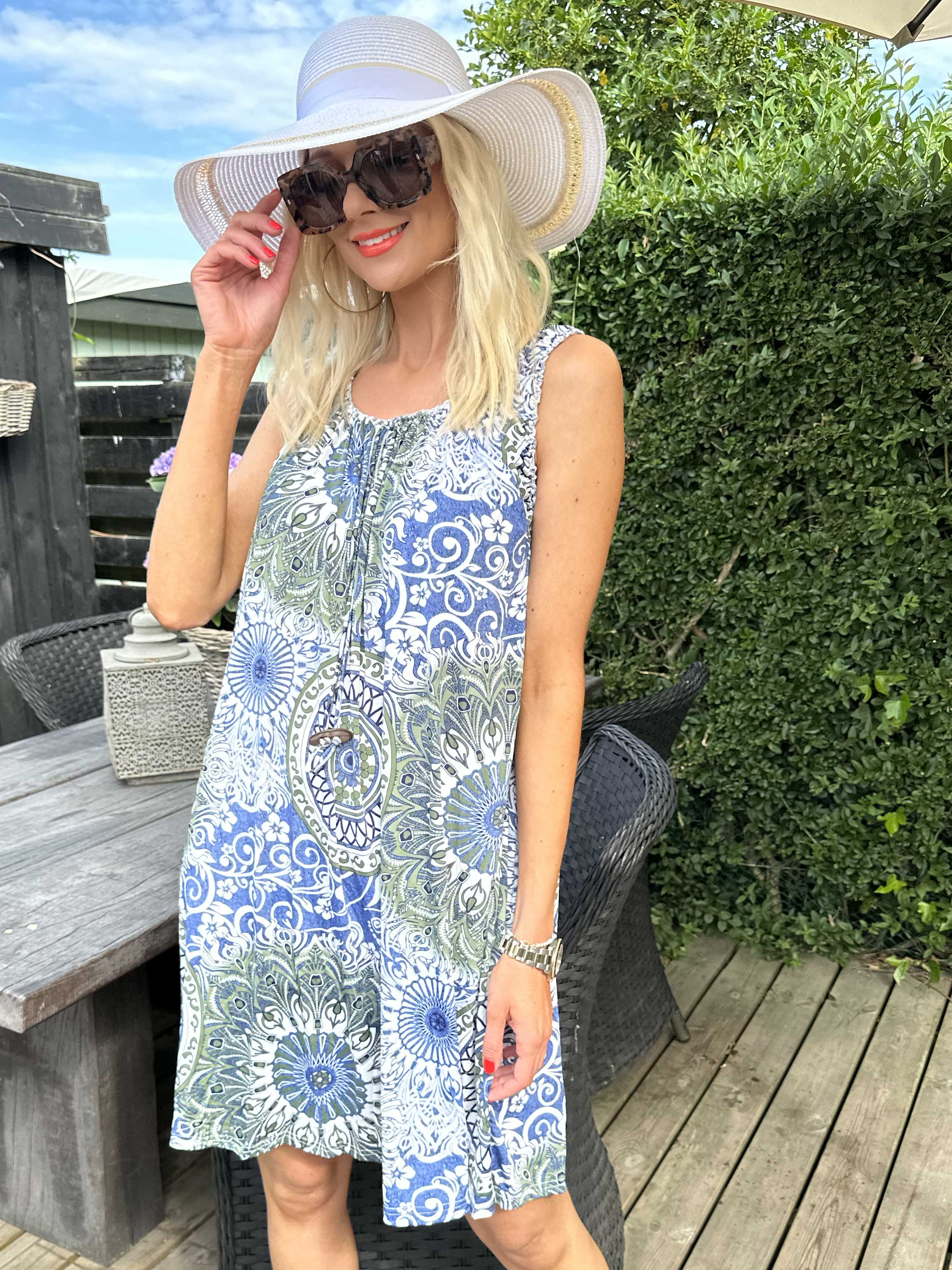 Zion - Mönstrad klänning med axelband i stretchigt tyg - Yellow