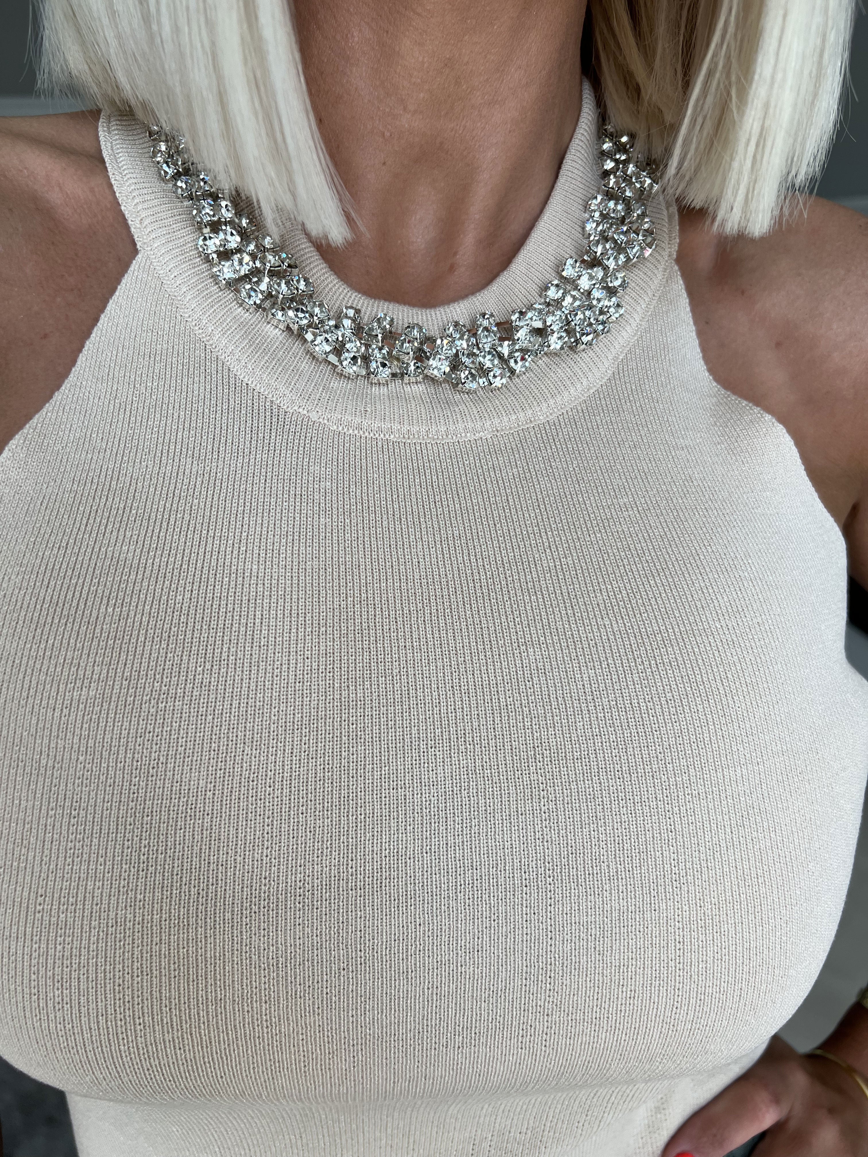 Elba - Top i stretchmaterial med halterneck och mockabård - Black