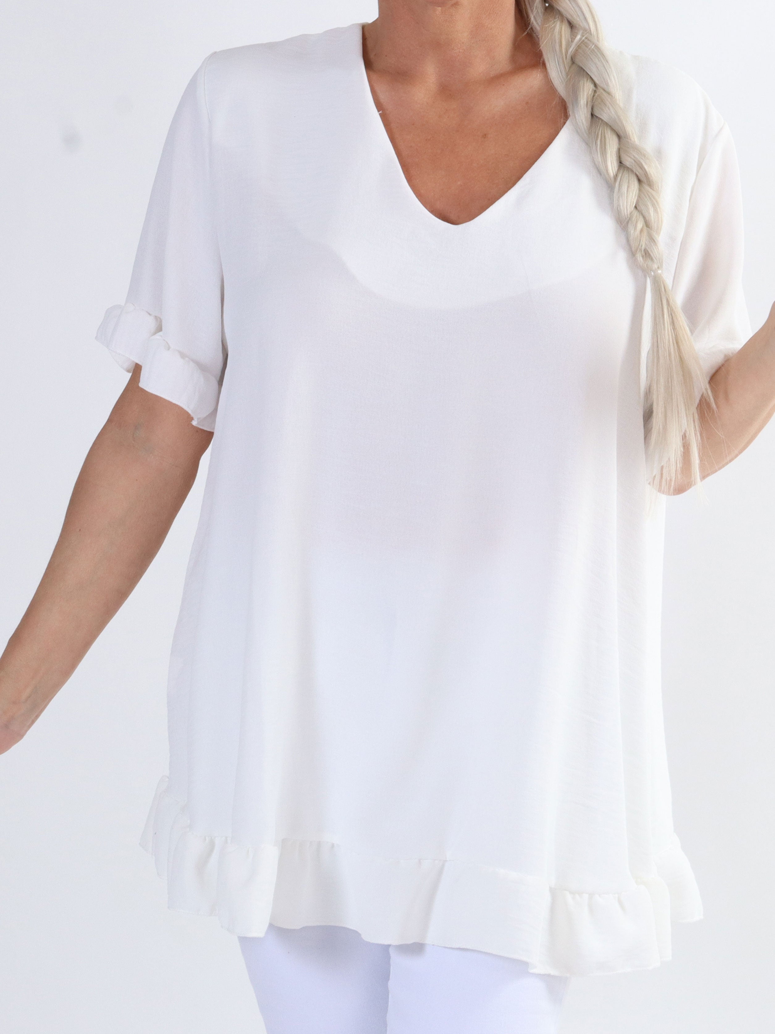 Mio - Söt tunika i stora storlekar med volangkanter