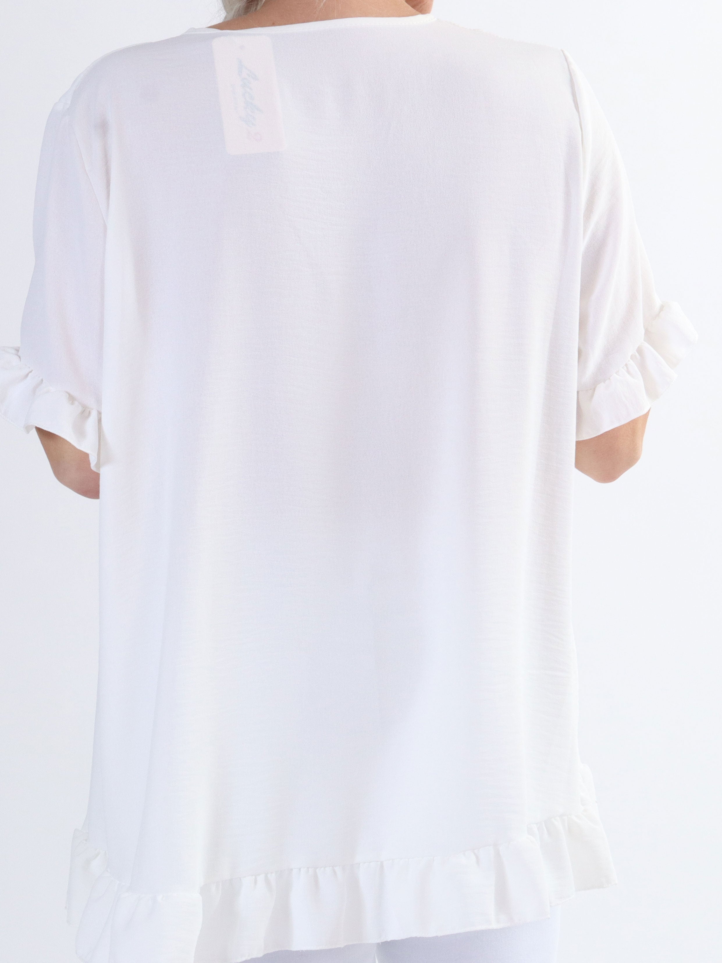 Mio - Söt tunika i stora storlekar med volangkanter