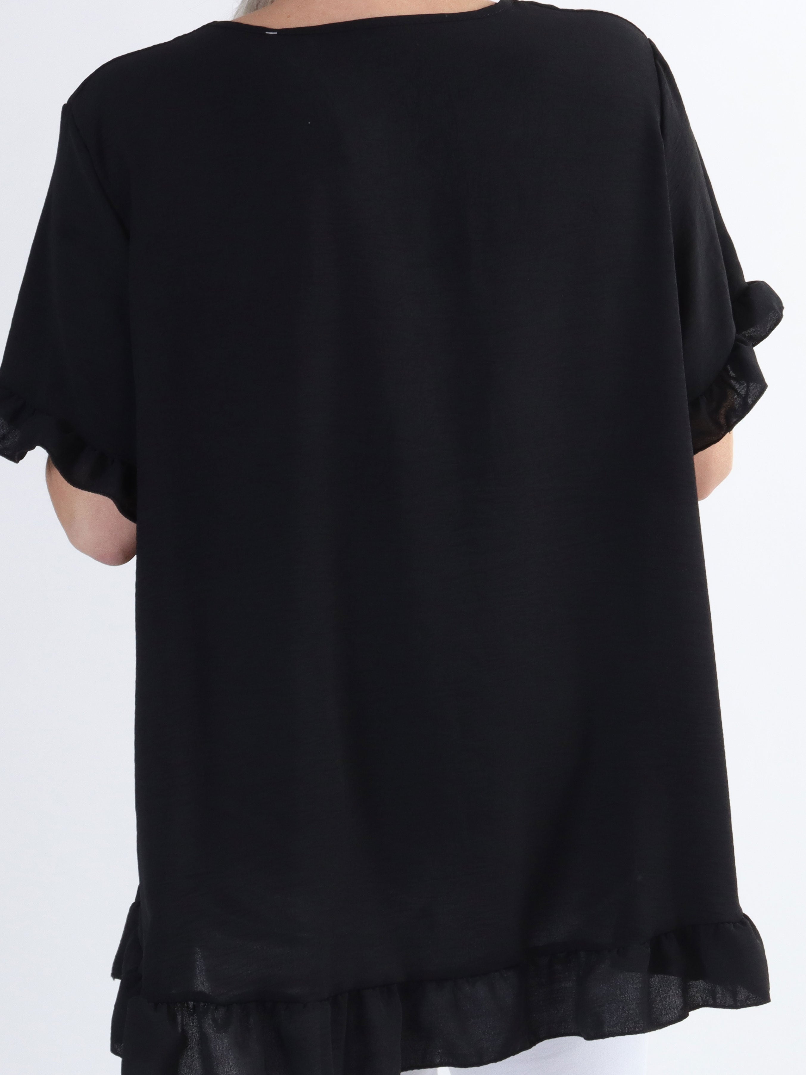 Mio - Söt tunika i stora storlekar med volangkanter